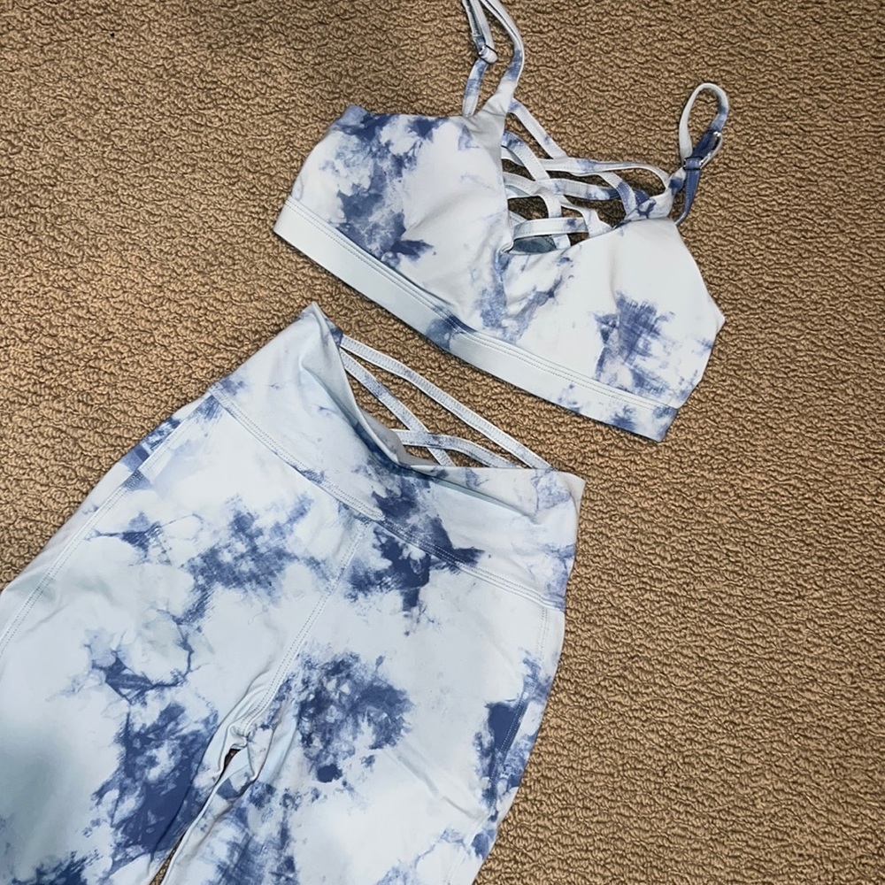 Blue tie dye bombshell sportswear leggings and sports bra.